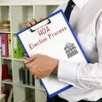 bartonville-tx-hoa-management-man-holding-election-process-clipboard