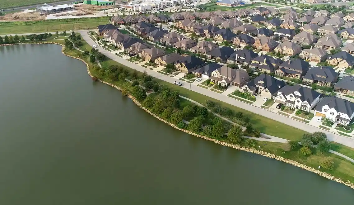 Northlake TX HOA management company aerial view of lake and neighborhood